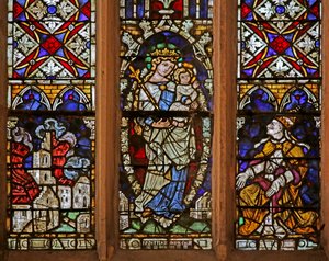 Window depicting Virgin and Child and Papal donor